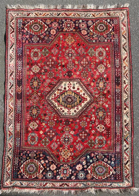 A 20th century Persian design rug, 6ft 11in by 4ft 8in.